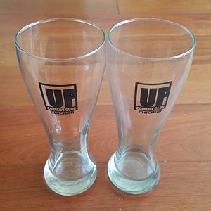 NWOT UP Comedy Set of 2 souvenir 16 oz glasses